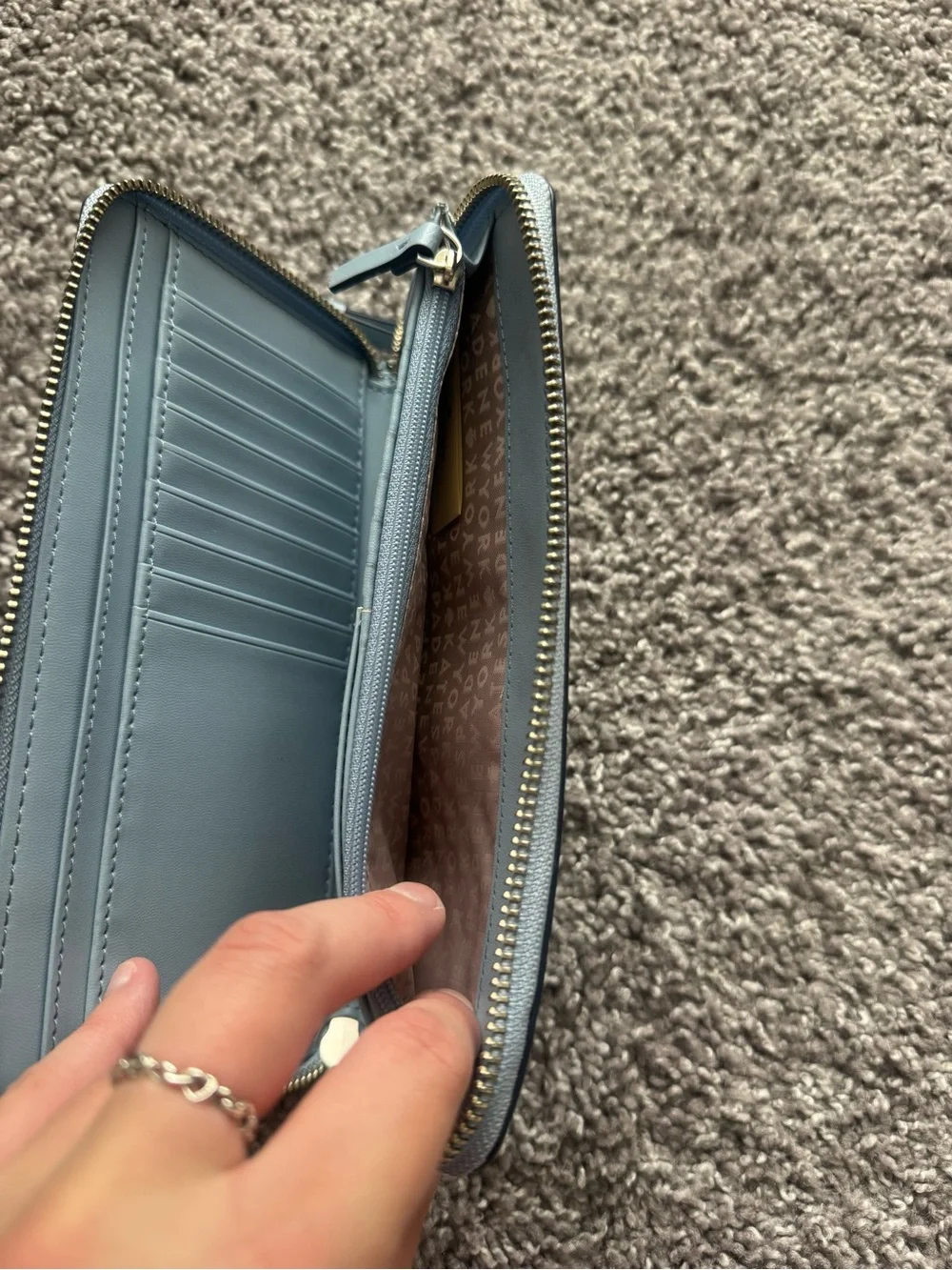 kate spade Light Blue Leather Wristlet Wallet with Gold Logo